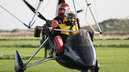 Extended Flexi Wing Microlight Flying In East Riding