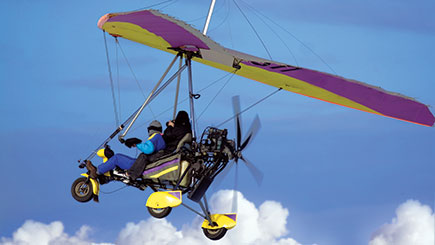Extended Flex-wing Microlight Flying In Bedfordshire