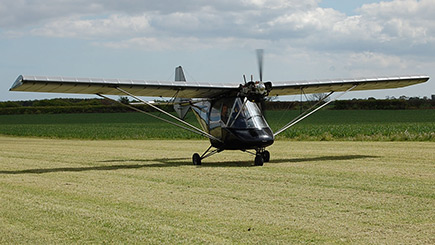Fixed Wing Microlight Flying In East Riding