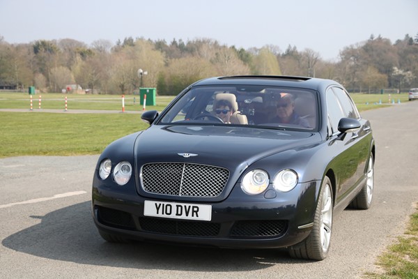 Young Driver Driving Lesson In A Bentley Flying Spur